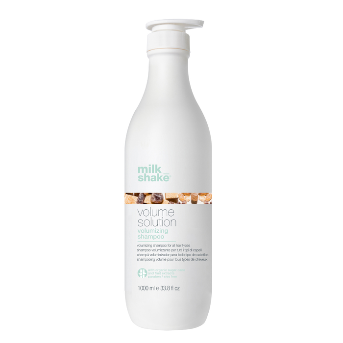 White bottle of milk_shake Volume Solution conditioner on a white background