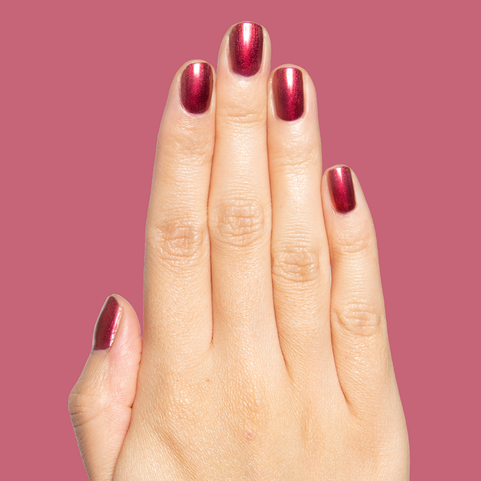 Budget? What Budget Gel deep rose-orange duochrome gel polish on natural nails for a polished manicure by Olive and June