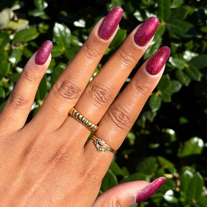 Budget? What Budget Gel deep rose-orange duochrome gel polish on long coffin-shaped nails for a radiant mani