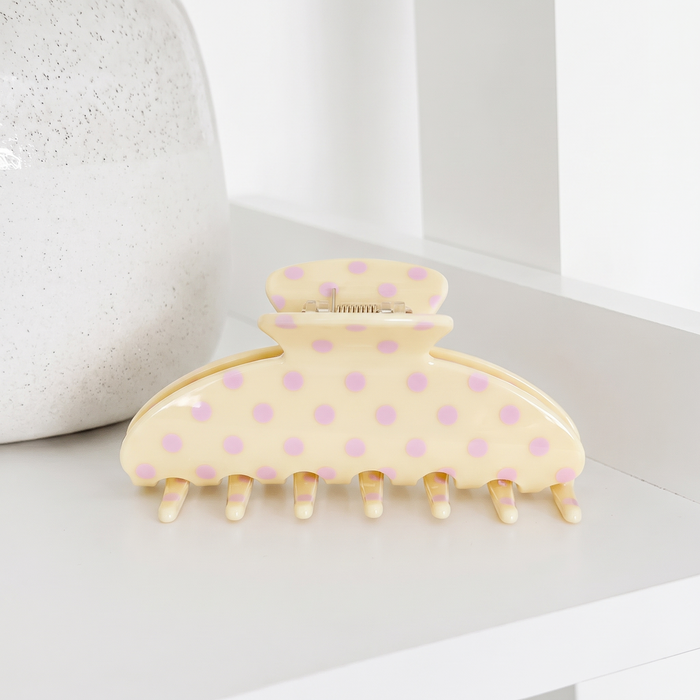 Pale yellow Claw Clip for hair with baby pink polka dots.