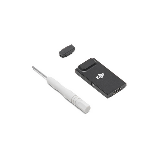The DJI Cellular Dongle 2 on a white background, alongside a white screwdriver and cable clip.