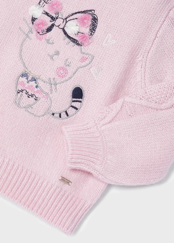 Closeup of Mayoral baby girl embroidered sweater showing front detail, cuff, and Pink knit fabric.