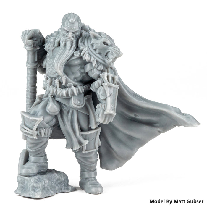 3D printed miniature warrior figure in grey ABS-like resin with flowing cape and staff
