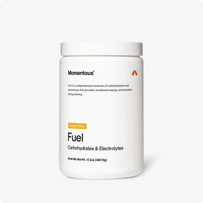 White plastic container of Momentous Fuel carbohydrate and electrolyte drink mix in mango flavor, 17.2 oz.