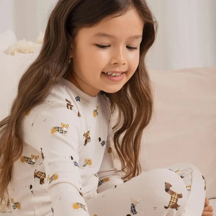 Petit Lem Tartan Hounds girls pajama set with soft cotton rib, rounded neckline, and dog artwork.