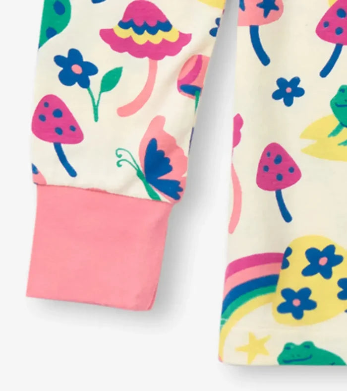 Closeup of Hatley girls bamboo pajama cuff with pink trim and Groovy Mushroom print.