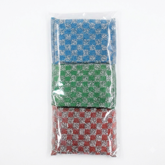 Three small woven fabric cleaning scrubs stacked vertically inside a clear plastic bag, each with a checkerboard pattern in blue, green, and red on a white background.