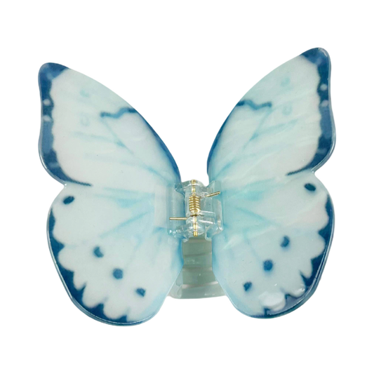 Light blue acetate large butterfly-shaped hair claw clip with sculptural wings and a secure claw closure.