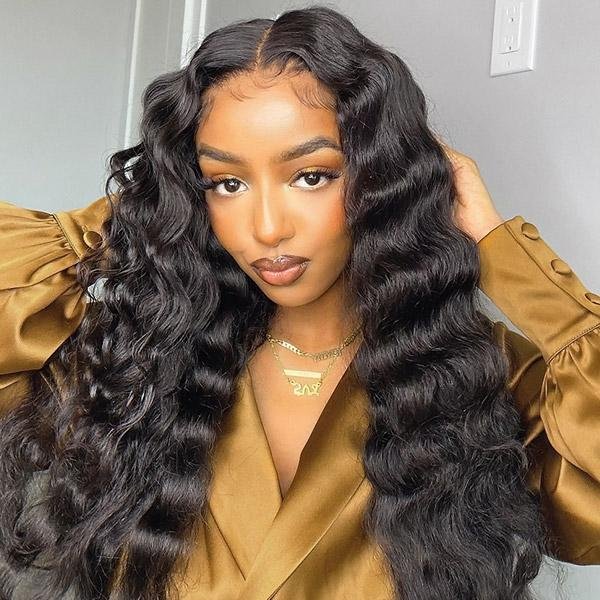restyled look of natural black loose deep wave human hair bundles with remy hair weave with 4x4 lace closure