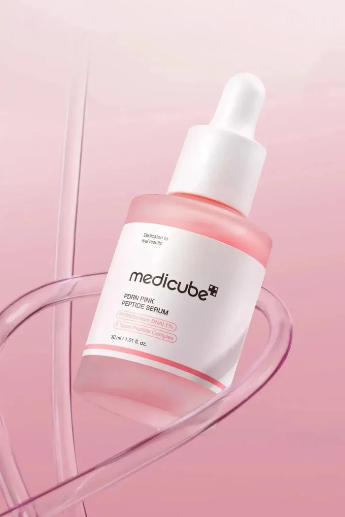Medicube PDRN Pink Peptide Serum bottle, a powerful Glass Skin Booster that delivers a dewy, radiant finish.