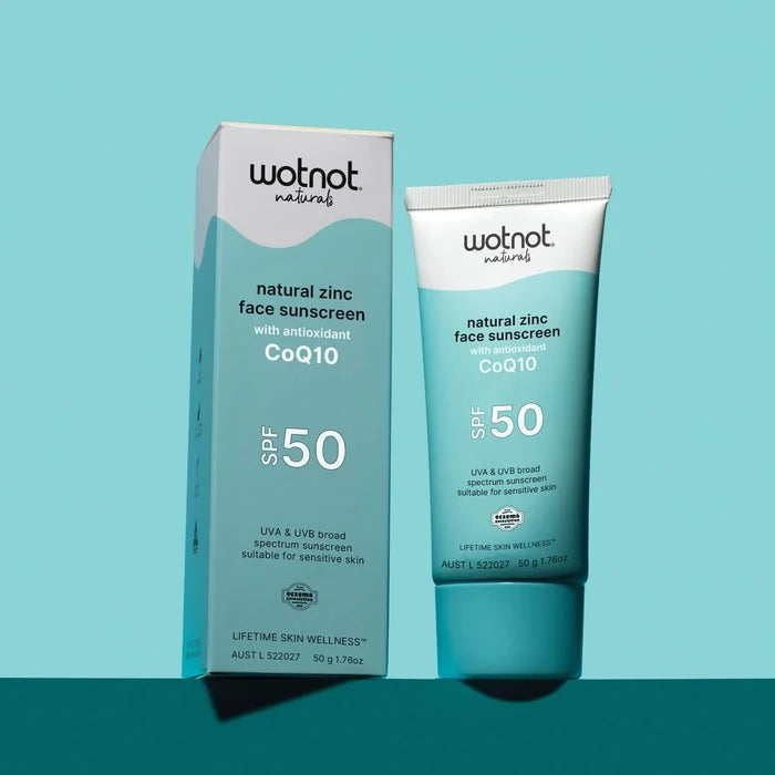 Wotnot natural zinc face sunscreen with CoQ10 on a blue background
