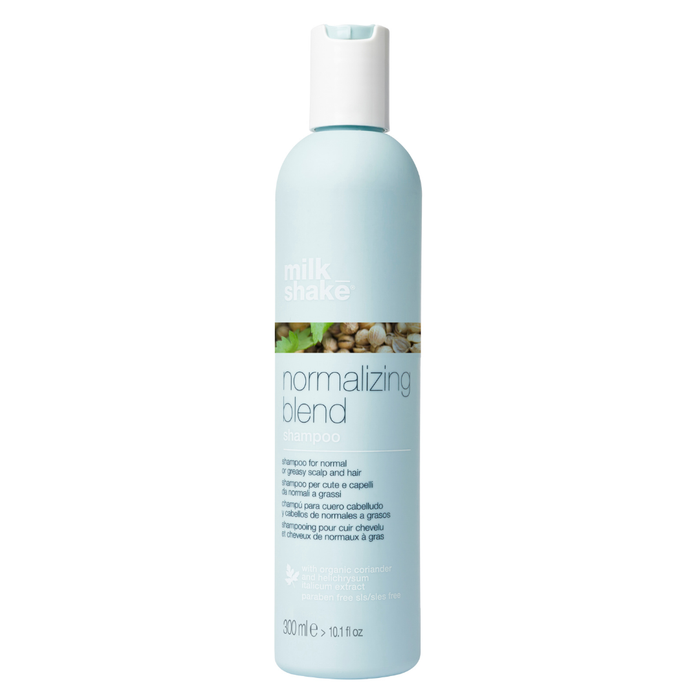 Bottle of milk_shake  normalizing blend shampoo on a white background