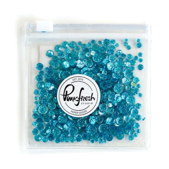 Pinkfresh - Glitter Drops Essentials. Perfect for adding glitzy accents to your crafting projects! Contains 1 pack of glitter embellishment drops in mixed sizes (3mm/4mm/5mm/6mm). Available in a variety of colors: each sold separately. Available at Embellish Away located in Bowmanville Ontario Canada. Lagoon.