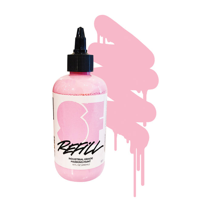 Bottle of pink marking paint refill with a color swatch on a white background.