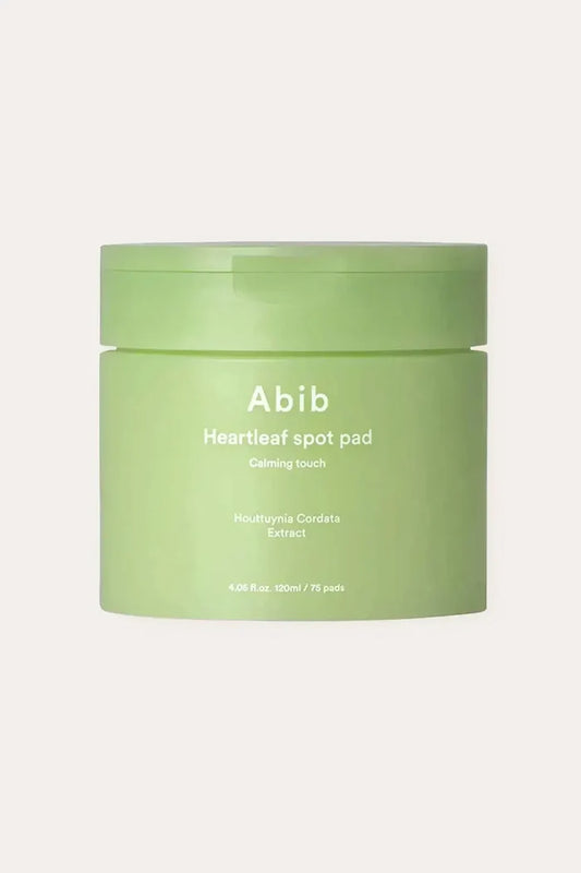 Product packaging of the best toner pad for sensitive acne prone skin with tweezers on a clean background.
