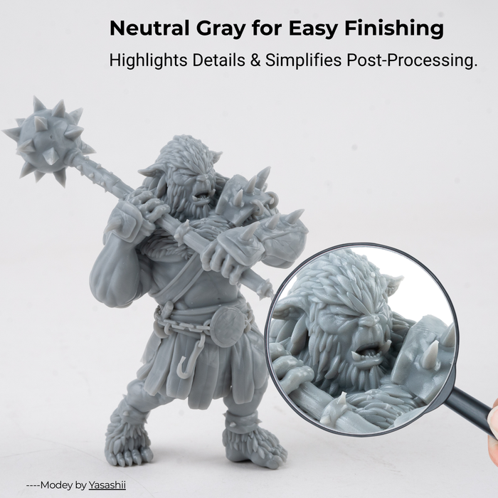 durable resin grey 3D printed orc warrior miniature magnifying glass showing fine detail