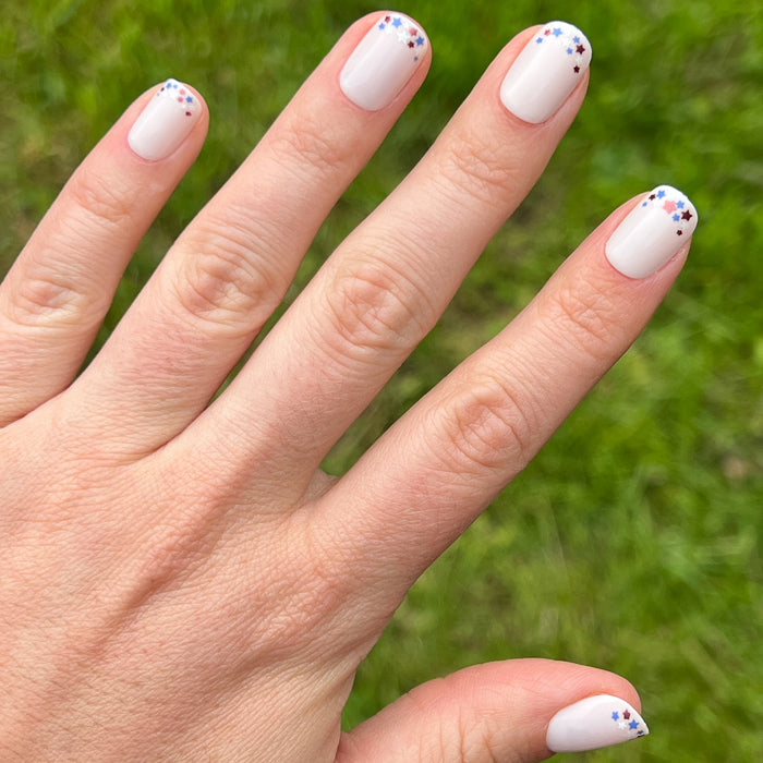 Star Showers | Squoval | Extra Short press-on mani with extra short squoval shape and small star French tips design