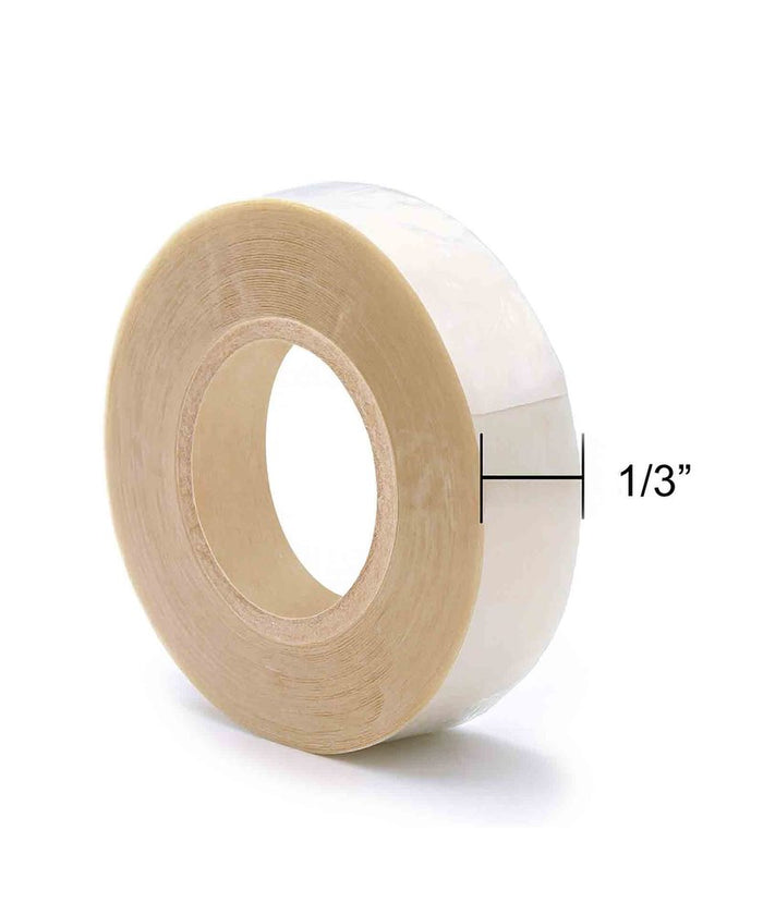 A transparent adhesive tape roll features a measurement line showing it is 1/3 inch wide.