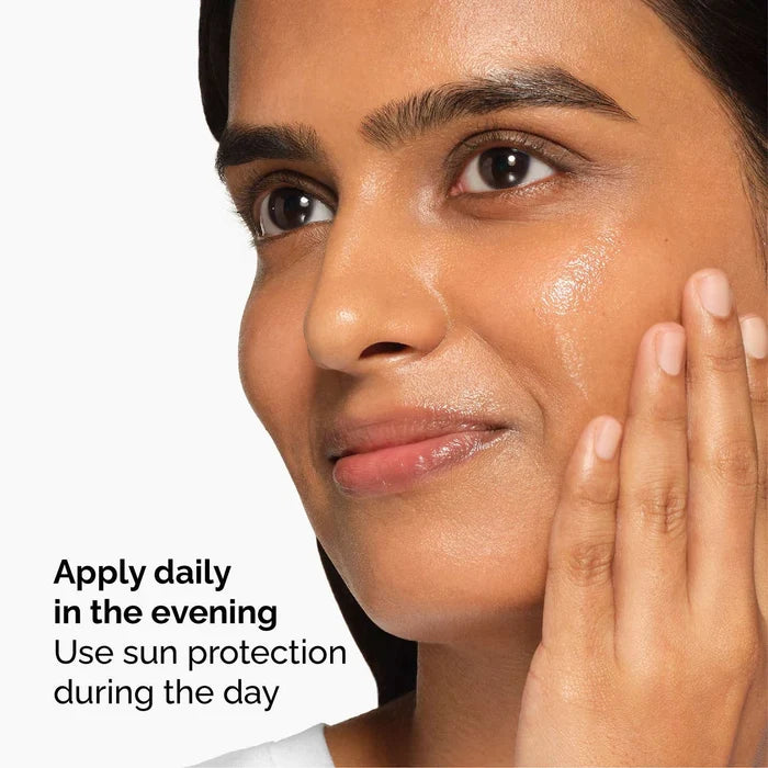 Woman applying sunscreen with text on how to use it